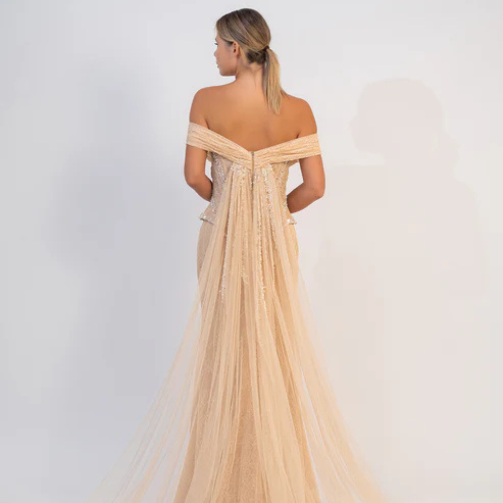 Shop online exquisite champagne mermaid gown with sculpted corset, delicate embellishments and timeless elegance, perfect for parties and special occasions.