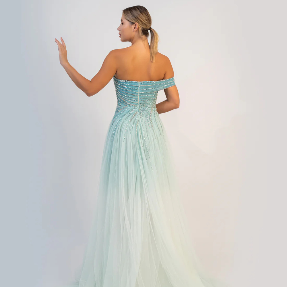 Shop online soft aqua A-line gown with shimmering details, sculpted draping and flowing tulle elegance, perfect for parties and special occasions.