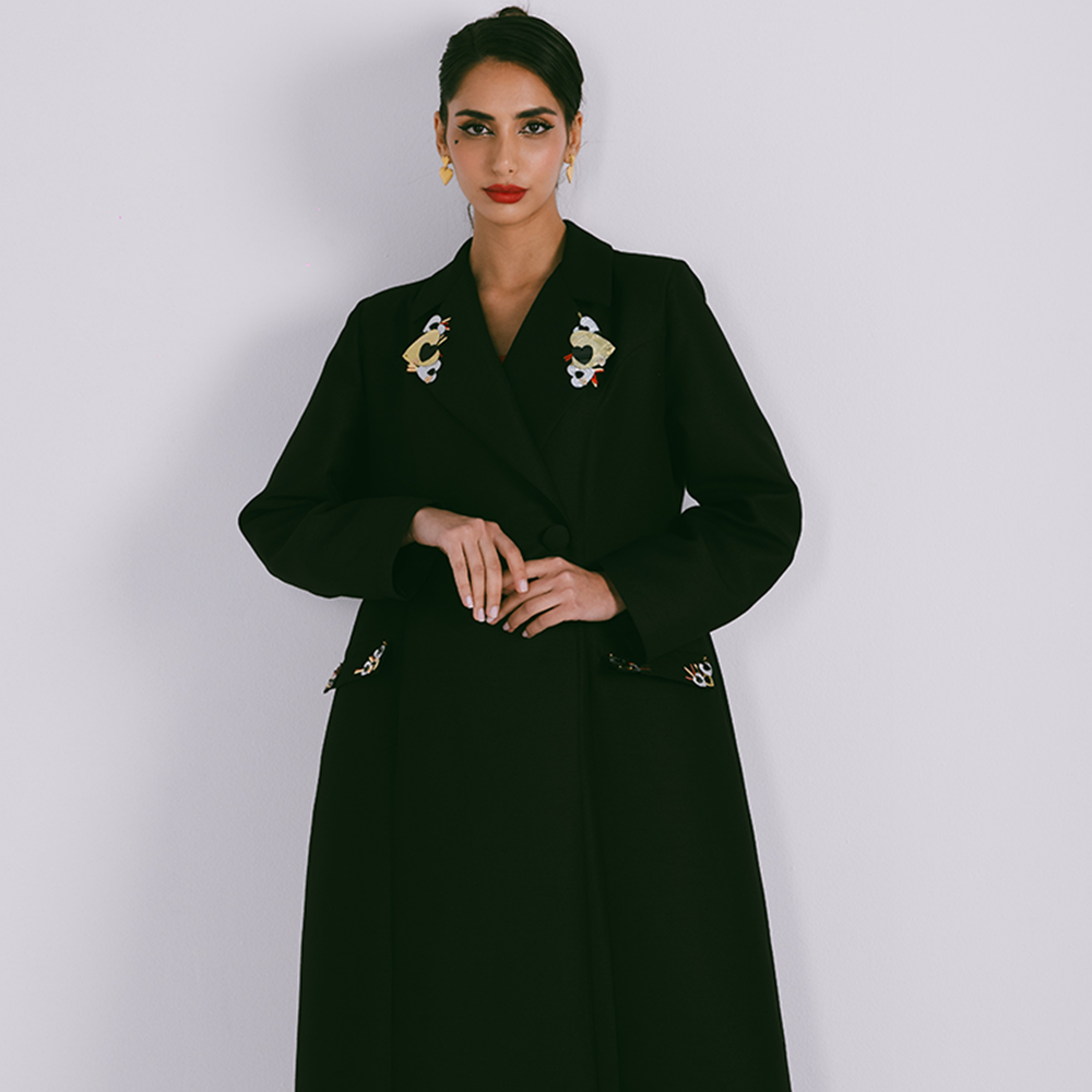 Blazer style abaya with embellishments on lapel & pockets with semi-stiff fabric. Explore designer women clothing. Shop now!