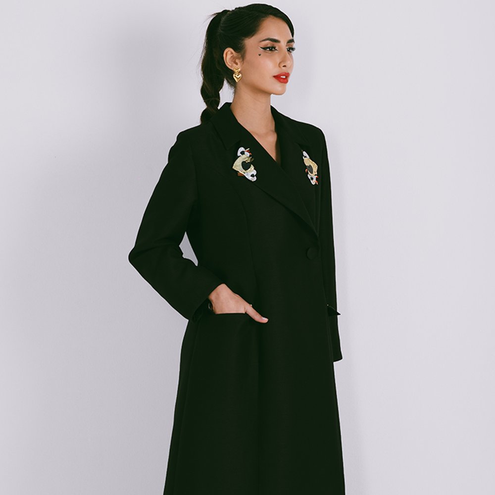 Blazer style abaya with embellishments on lapel & pockets with semi-stiff fabric. Explore designer women clothing. Shop now!