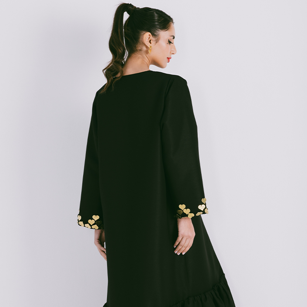 Fitted sleeve abaya embellished with metal heart motifs with gathered hemline. Comes with sheila. Explore designer abaya for women. Shop now!