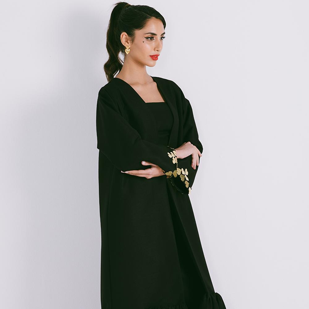 Fitted sleeve abaya embellished with metal heart motifs with gathered hemline. Comes with sheila. Explore designer abaya for women. Shop now!