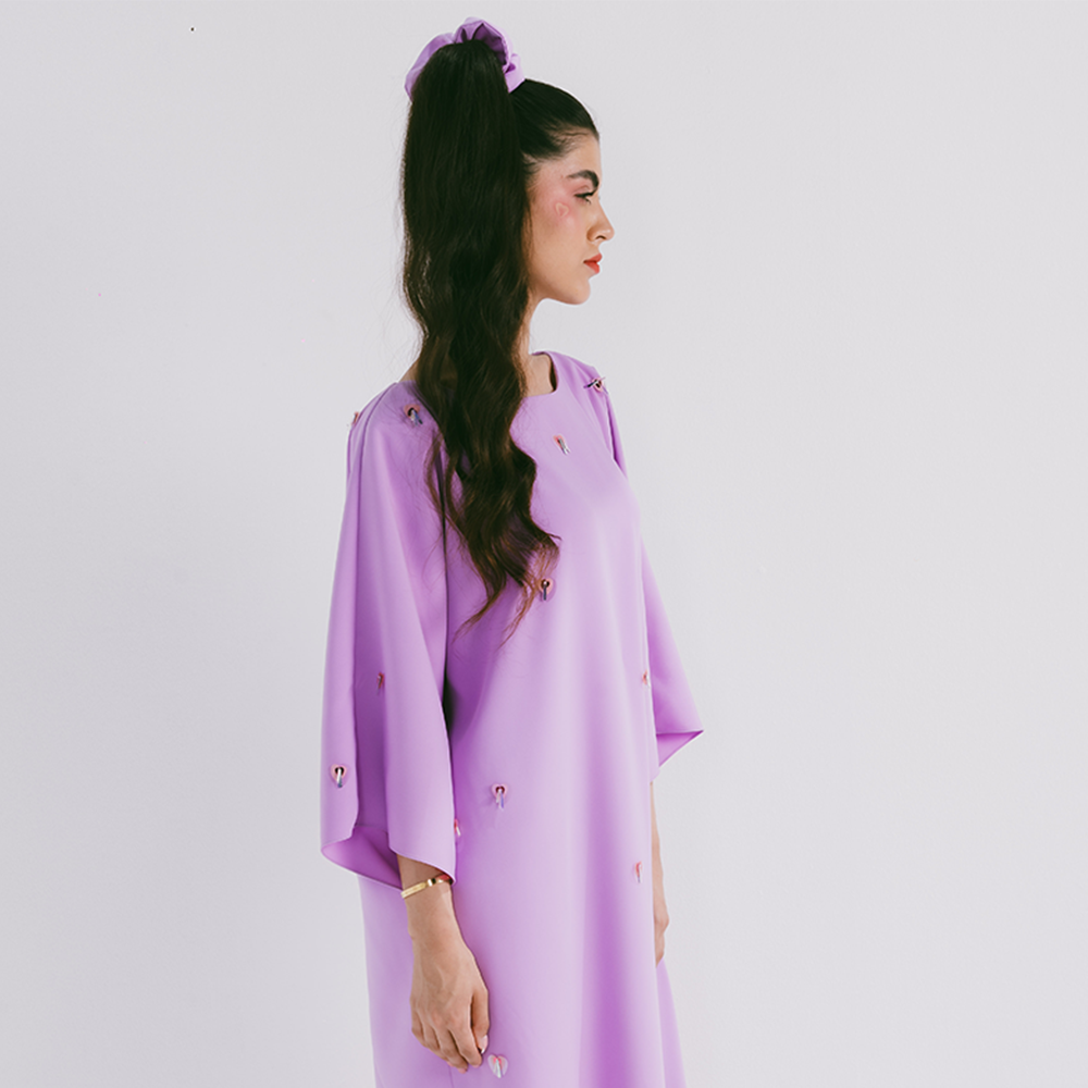 Classic cut kaftan with scattered embroidery in crepe fabric. Available in 2 color options. Dry clean. Shop designer women clothing online. Shop now!