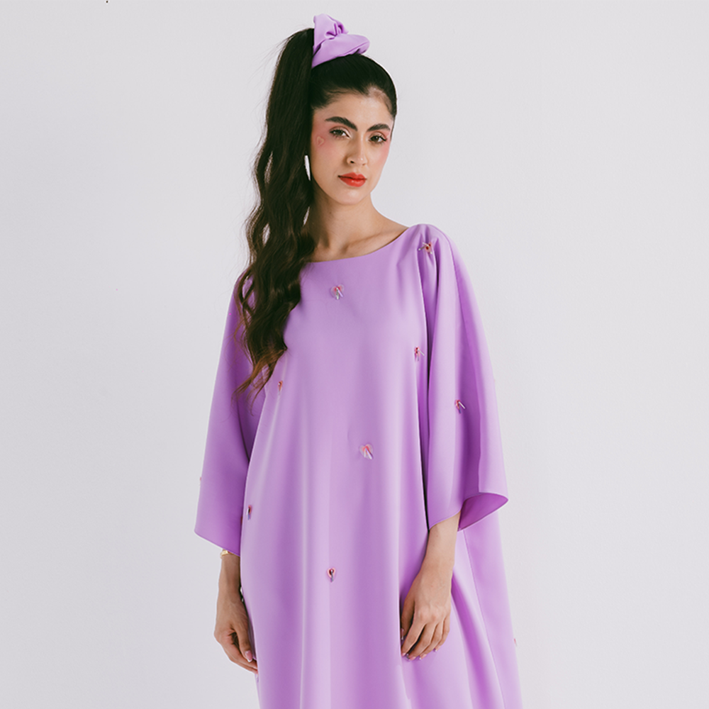 Classic cut kaftan with scattered embroidery in crepe fabric. Available in 2 color options. Dry clean. Shop designer women clothing online. Shop now!