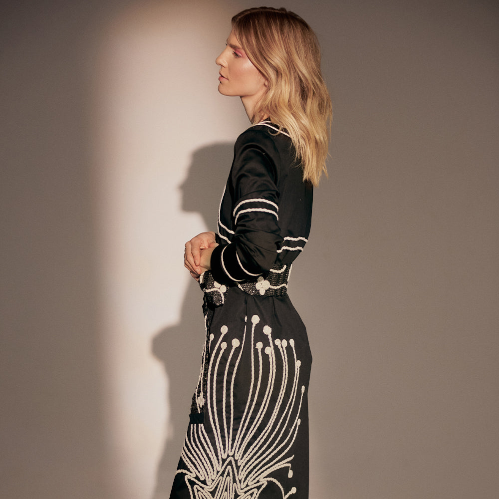 Trench-Style Midi Dress, Hand-Embroidered Appliques, Classic Sleeves. Drape yourself in allure with our Adormidera Dress.
