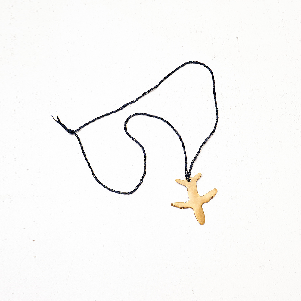 Add a touch of adventure to your jewelry collection with our charming airplane necklace. A must-have for any accessories website. Shop Now!