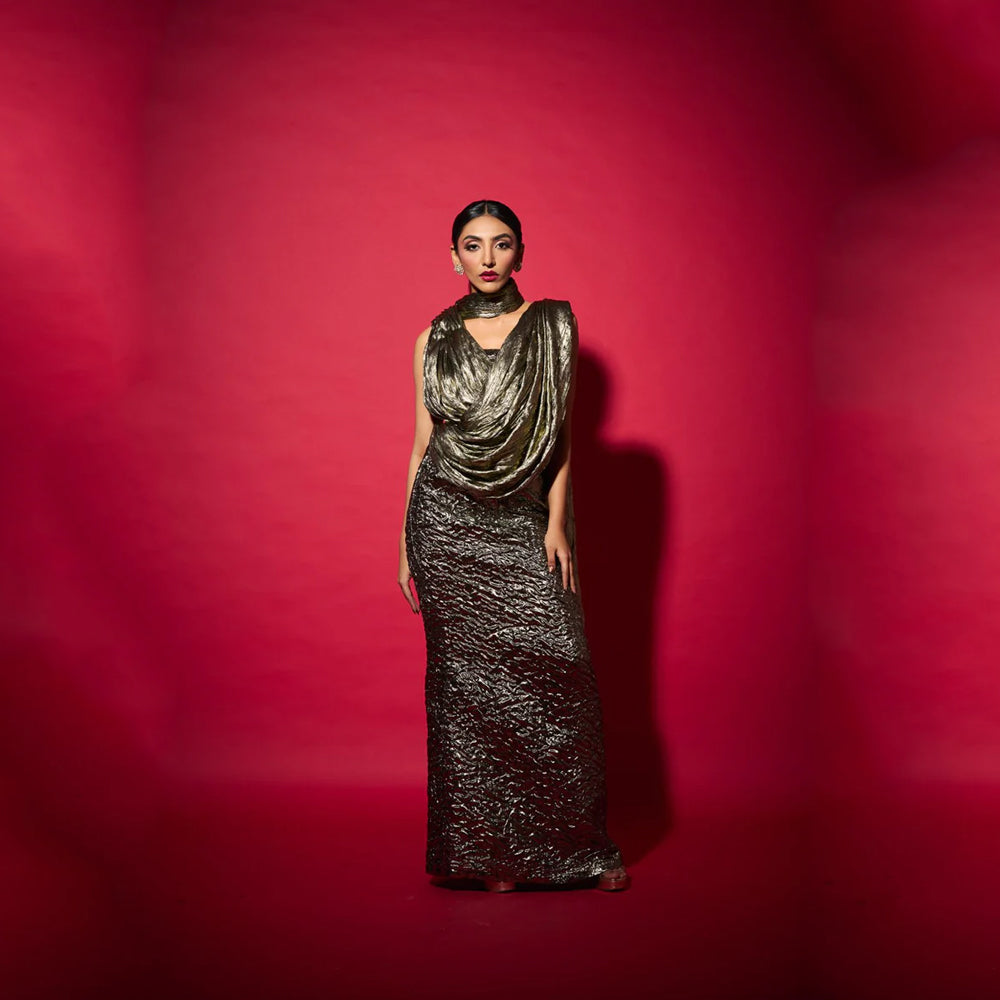 Fusion saree gown with draped neckline and bustier skirt, perfect for events. Shop online from our curated edit of premium fashion.