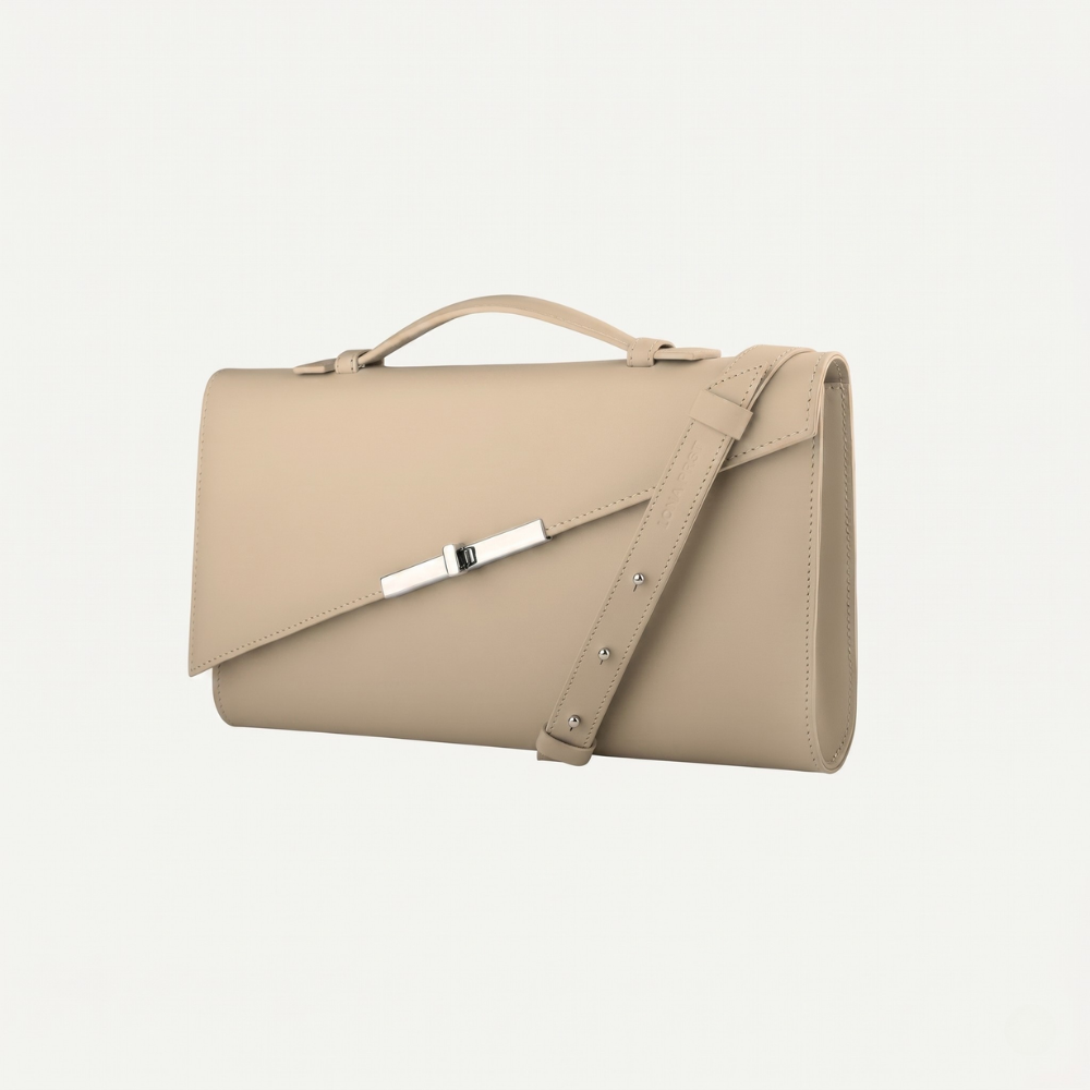 Italian leather clutch with strap and silver hardware, pre order item. Shop online from our curated edit of premium fashion.
