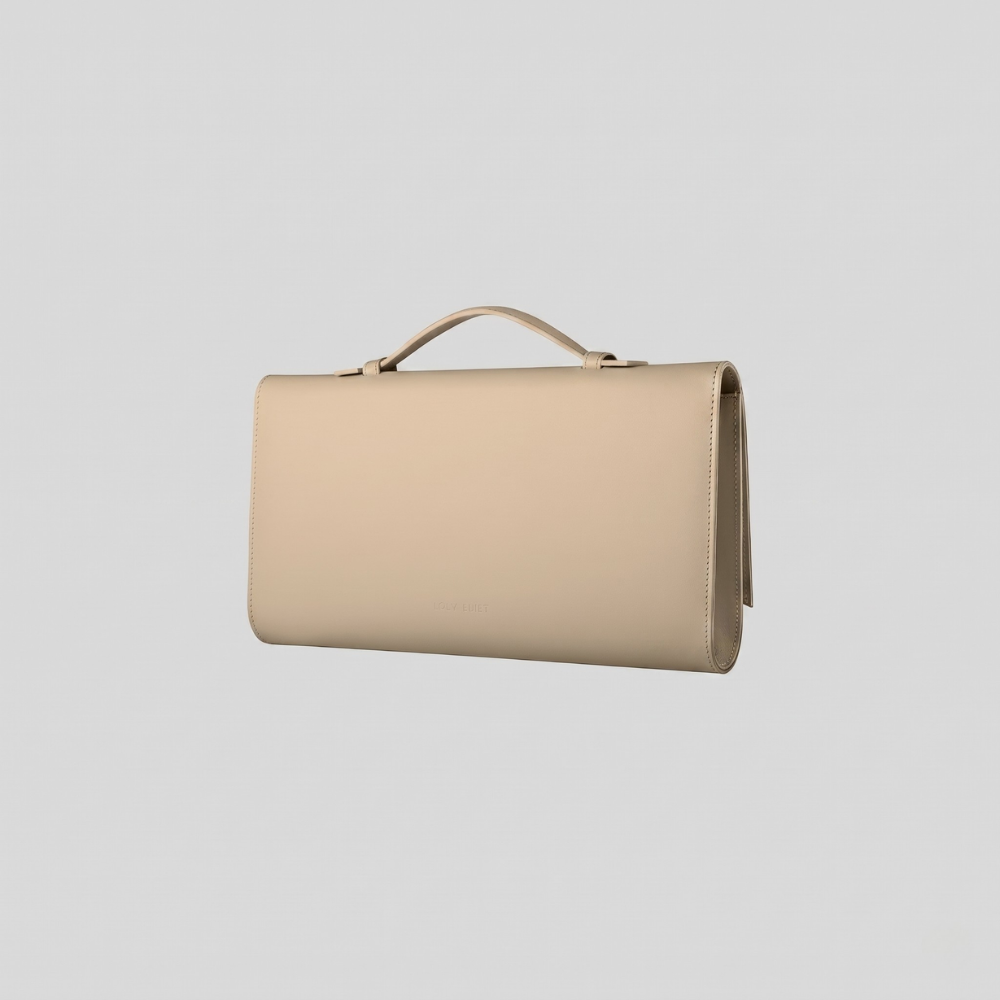 Italian leather clutch with strap and silver hardware, pre order item. Shop online from our curated edit of premium fashion.