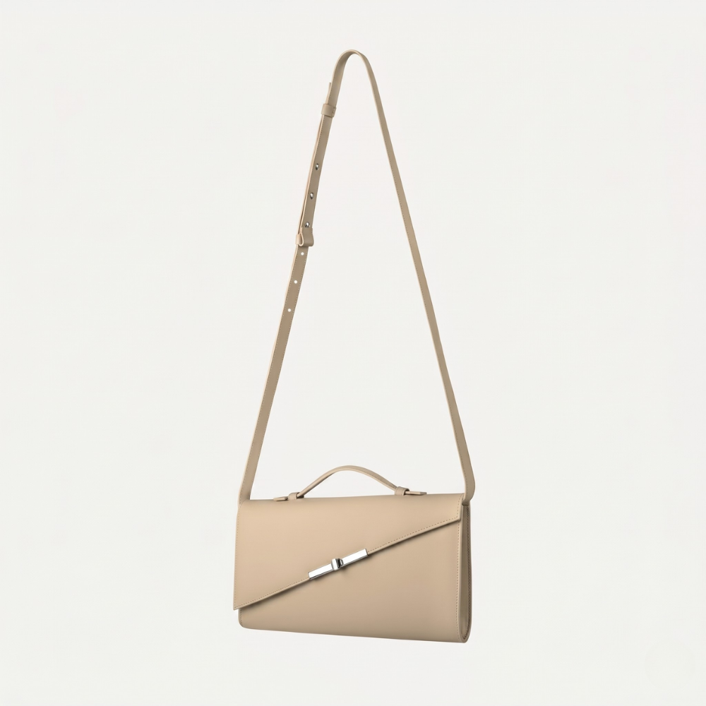 Italian leather clutch with strap and silver hardware, pre order item. Shop online from our curated edit of premium fashion.
