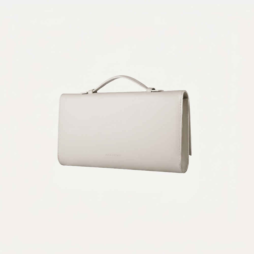 Italian leather clutch with detachable strap and silver hardware, pre order item. Shop online from our curated edit of premium fashion.