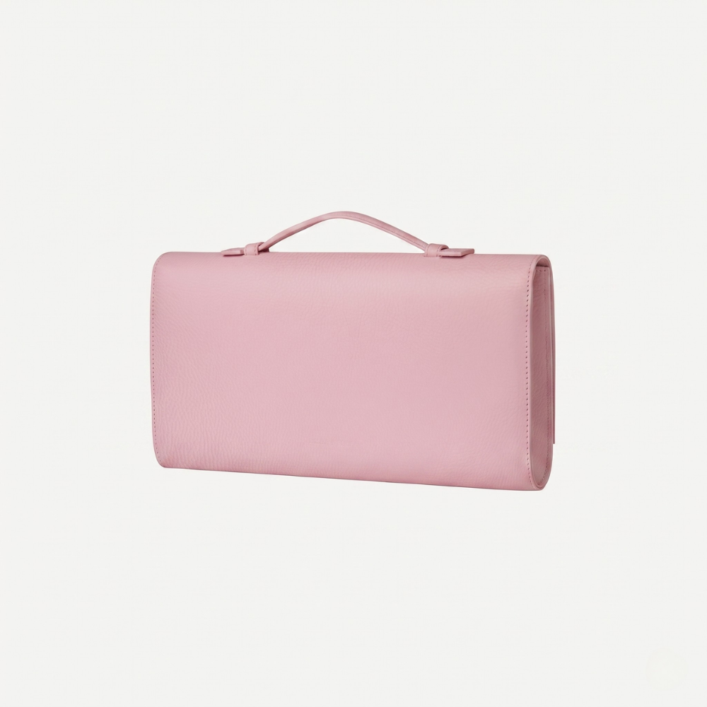 Italian leather clutch with strap and silver hardware, perfect for events. Shop online from our curated edit of premium fashion.