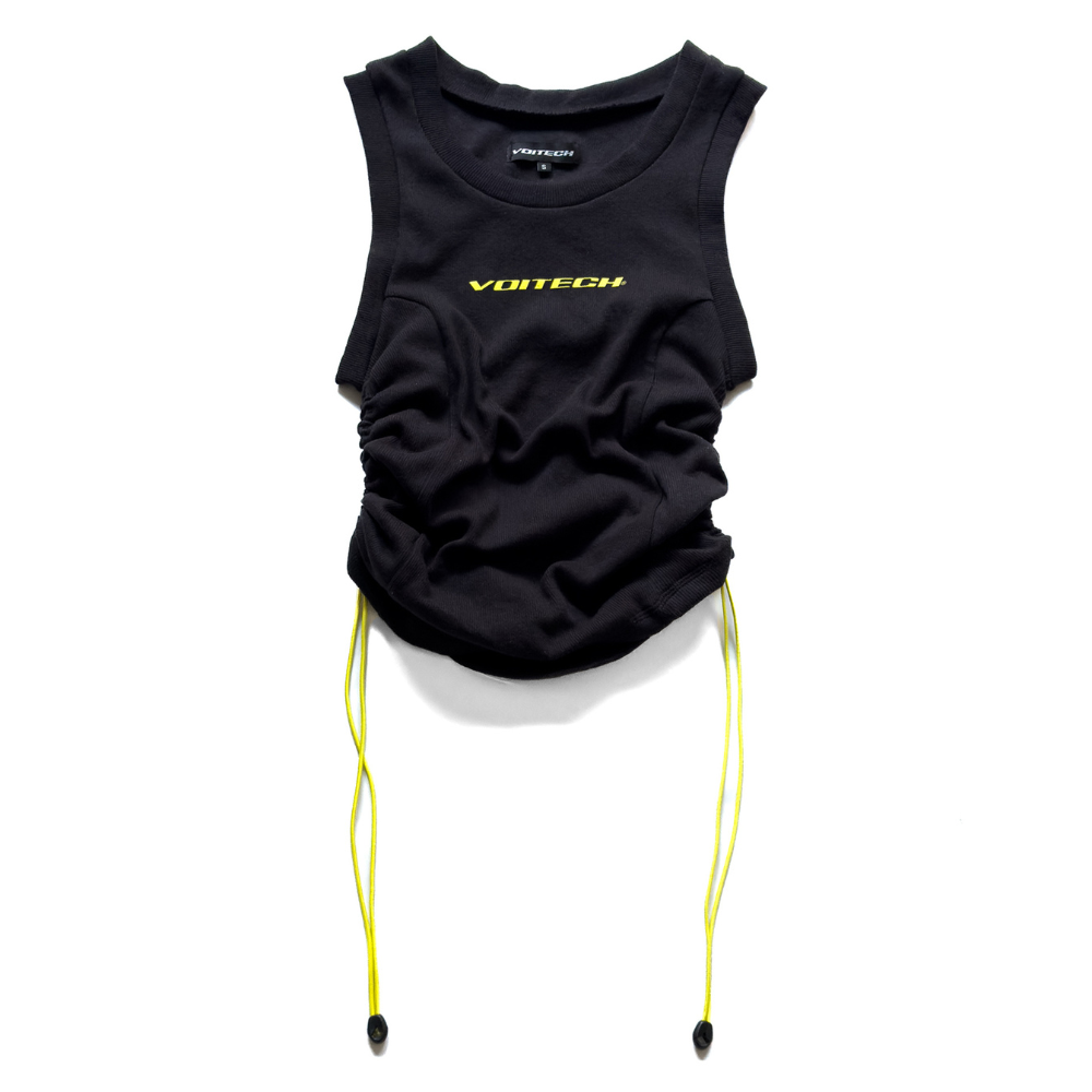 Shop online from our exclusive website and discover the Alpha Bungee Ribbed Vest by Voitech®, featuring ribbed stretch cotton, adjustable bungee detailing, and a bold technical streetwear design.
