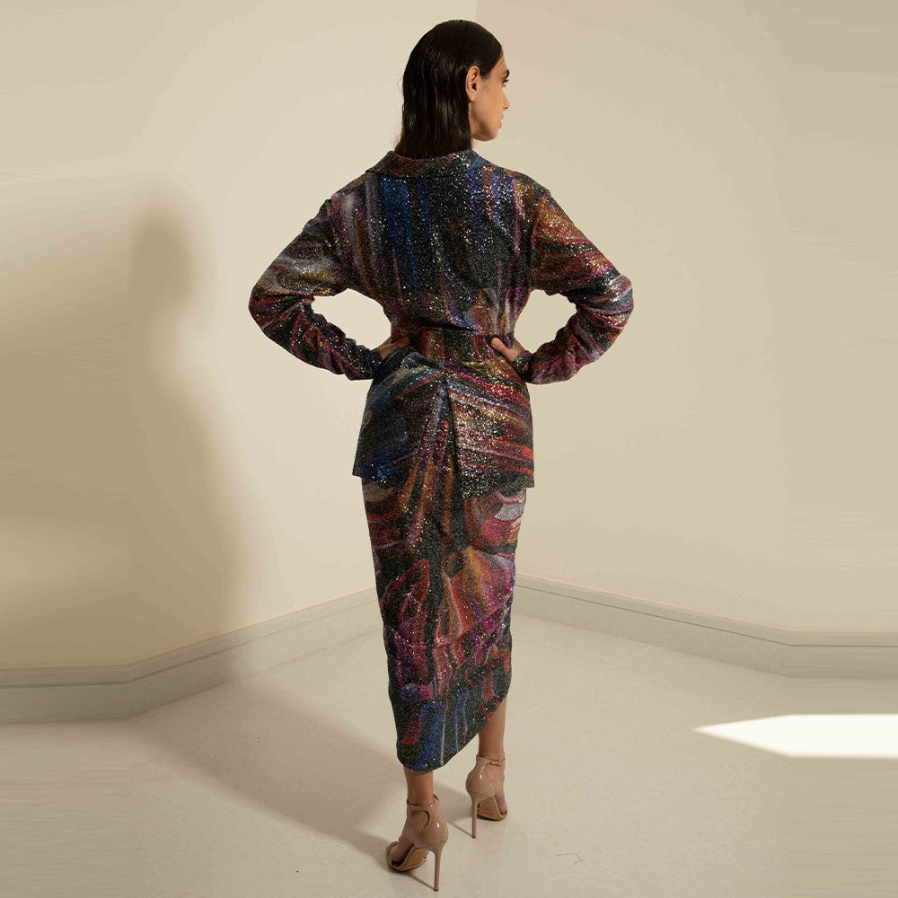 Blazer with puffy sleeves and incorporated waist belt in printed sequins. Elevate your style with the Amara Blazer Print.