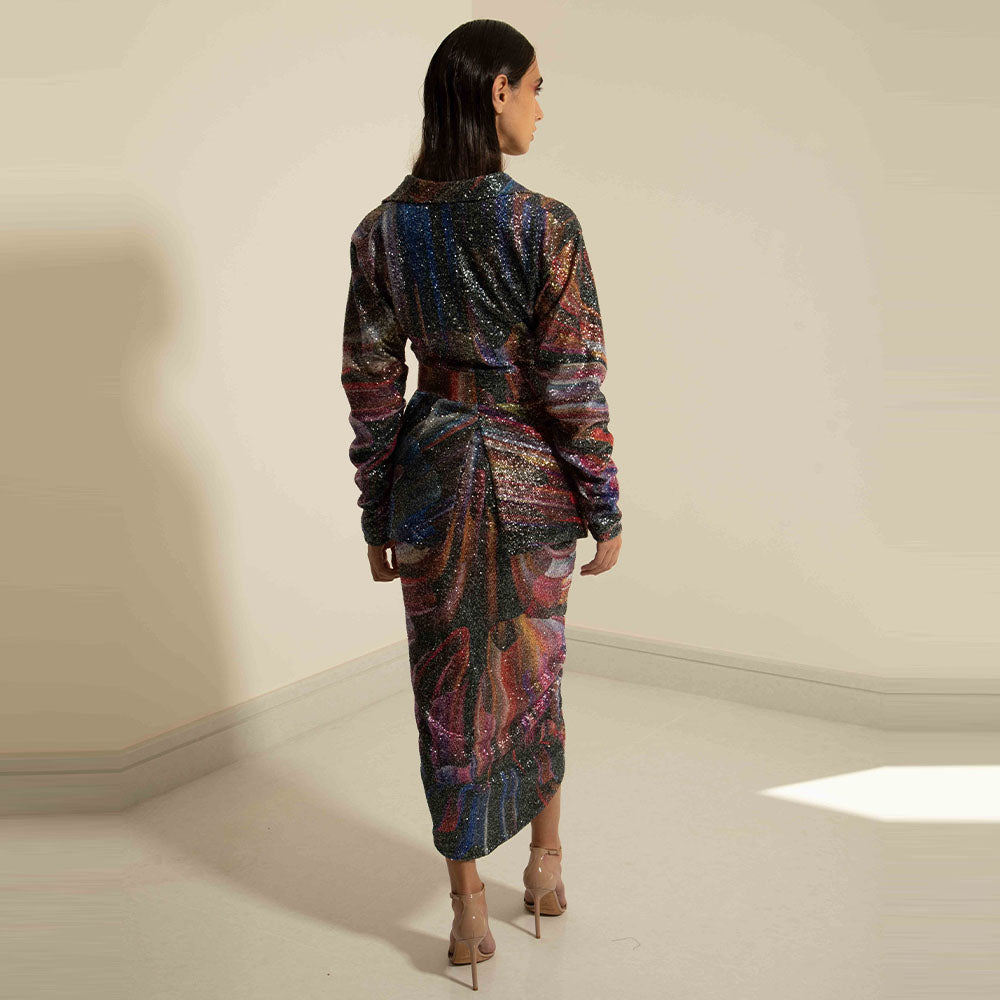 Blazer with puffy sleeves and incorporated waist belt in printed sequins. Elevate your style with the Amara Blazer Print.