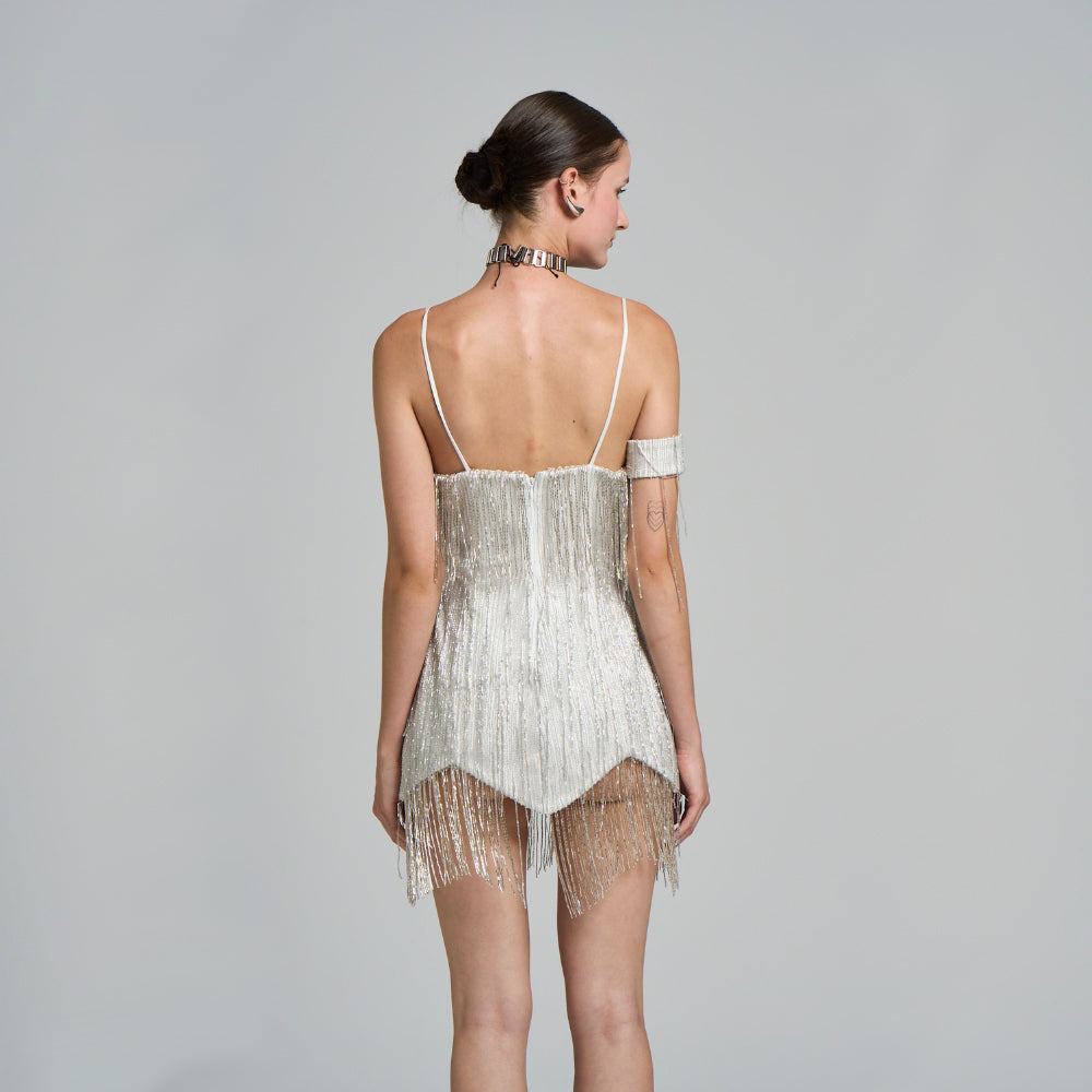 Hand embroidered stripe detail .With suspenders .Embroidered fabric .Fringe detail.Asymmetrical cut .Mini Party Dress