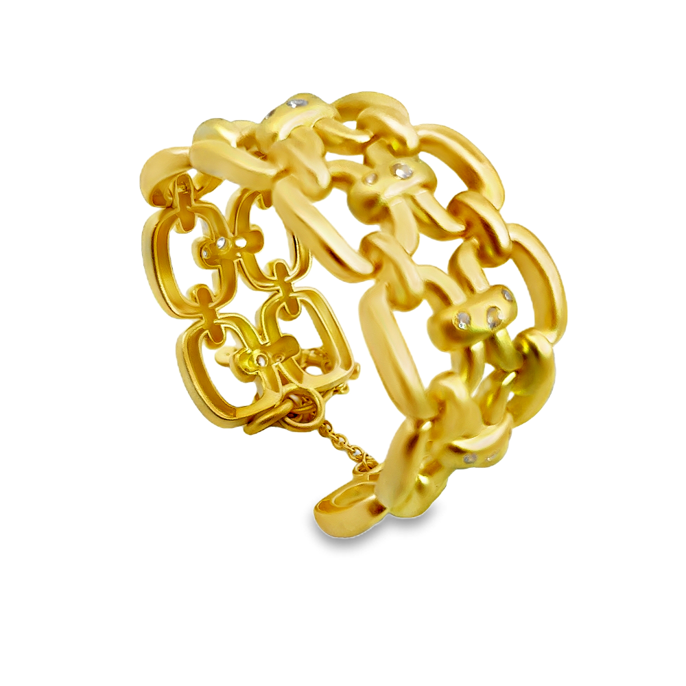 Sterling silver 18k gold-dipped link chain bracelet with sparkling cubic zirconia detailing for a bold statement finish. Shop premium jewelry online.