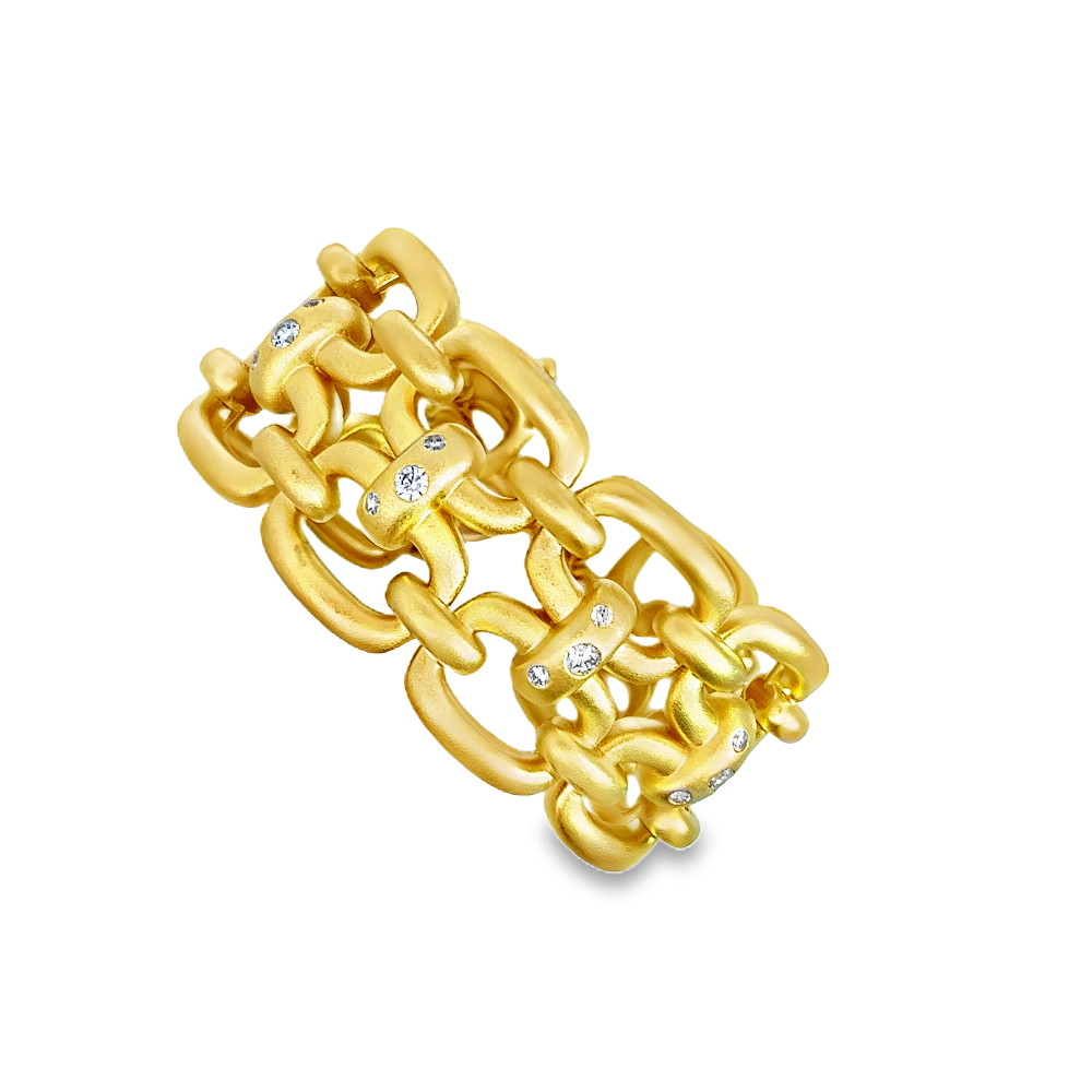 Sterling silver 18k gold-dipped link chain bracelet with sparkling cubic zirconia detailing for a bold statement finish. Shop premium jewelry online.