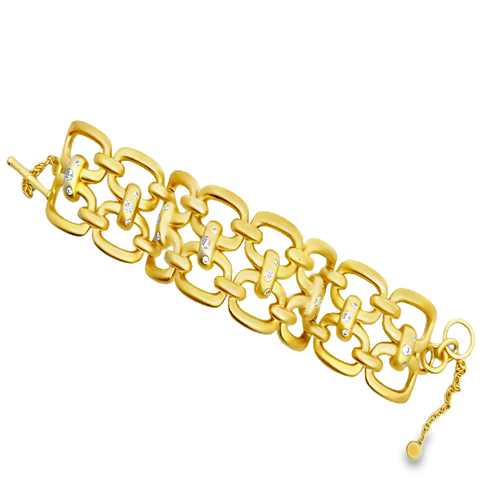 Sterling silver 18k gold-dipped link chain bracelet with sparkling cubic zirconia detailing for a bold statement finish. Shop premium jewelry online.