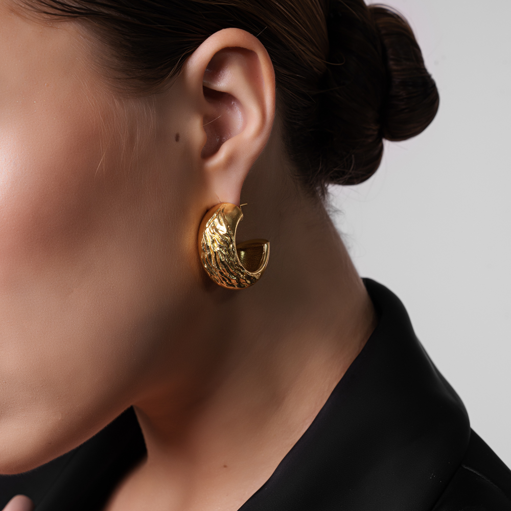 Chunky yet easy to style hoops inspired by the texture found on the ask wood that is coarse with straight grains. 