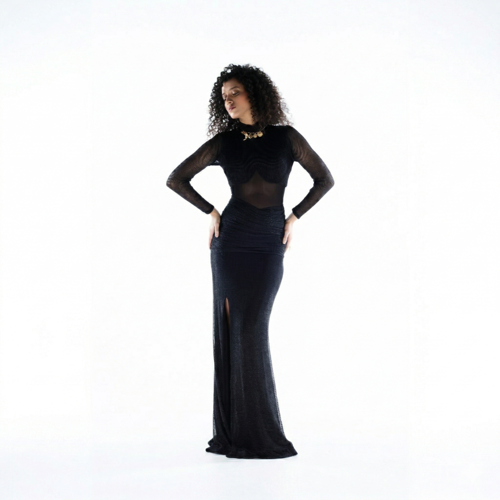 Black shimmer bustier dress with gathered skirt and slit, perfect for brunch and vacations. Shop online from our exclusive collection of premium styles.