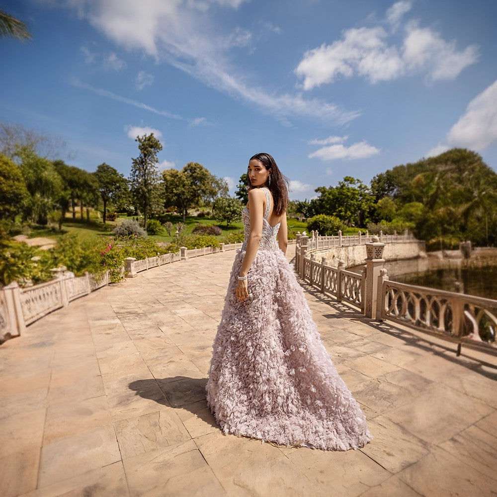 Signature Organza Feather Textured skirt with Cosmic shower embroidery over bodice.