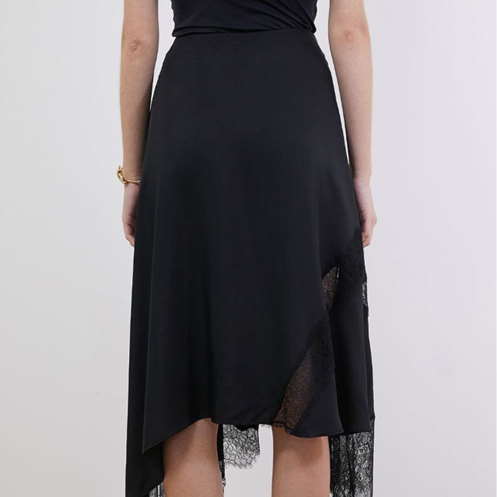 Raw-edged, Round neckline One side handkerchief-hem with patch pocket Adjustable tie belt at waist Relaxed silhouette. 