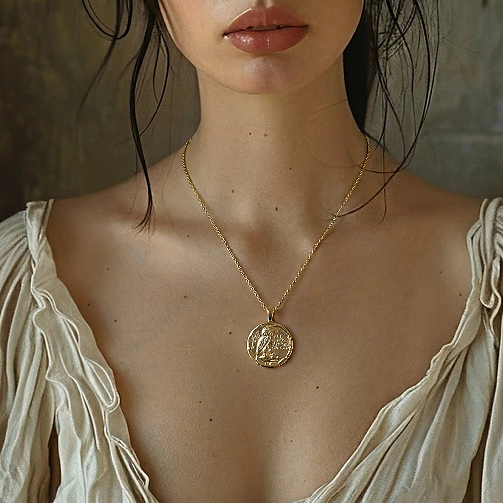 Discover the Athena’s Owl Coin Necklace at The Luxe Maison, inspired by Greek mythology and the owl symbol of wisdom. A timeless statement of elegance.