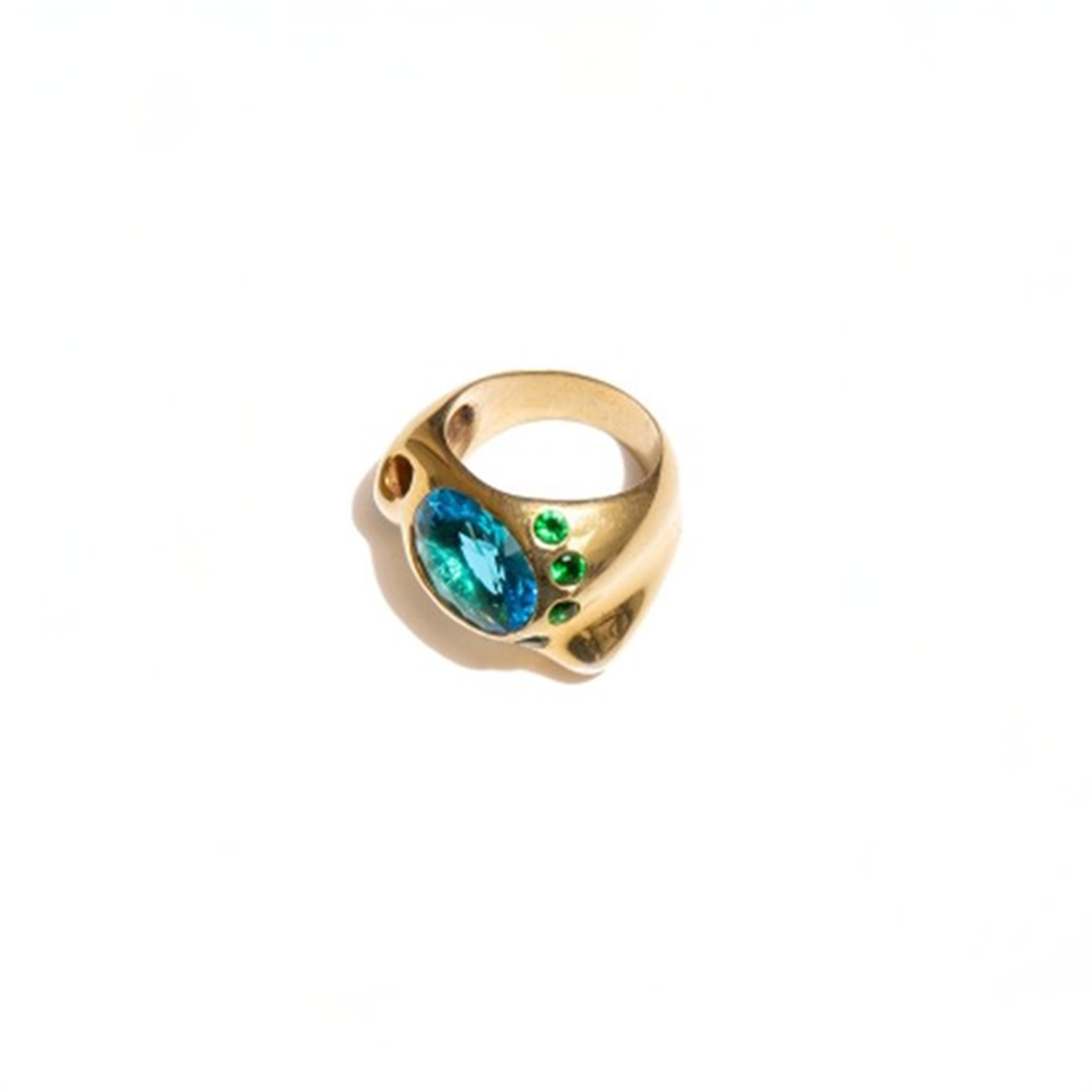 Ring with wavy surface and multi colored zircon stones.