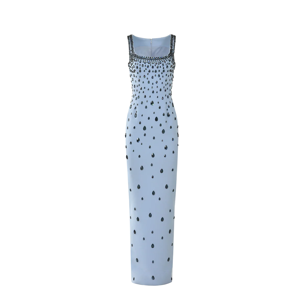 A sky blue column dress fully embroidered with midnight blue pear shaped crystals.
