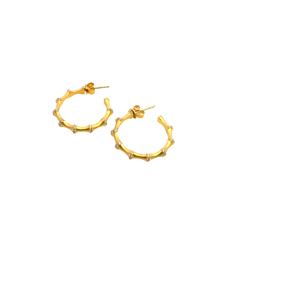 Shop online premium 18K gold bamboo hoop earrings with sparkling cubic zirconia stones.