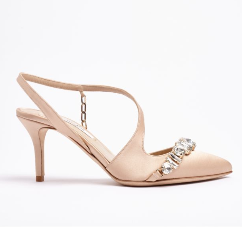 An elegant mid-heel pump in nude satin designed to instantly elevate your look.