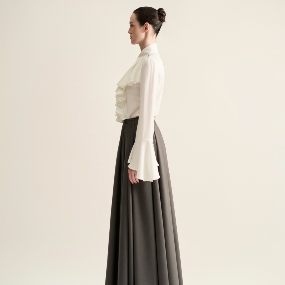 Bella blouse blends with stylish womenwear. Shop Now!