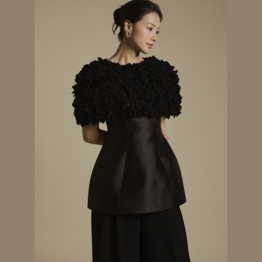 Discover chic luxury designer dresses paired perfectly with the Black Bloom 3D Floral Cape. Shop Now!