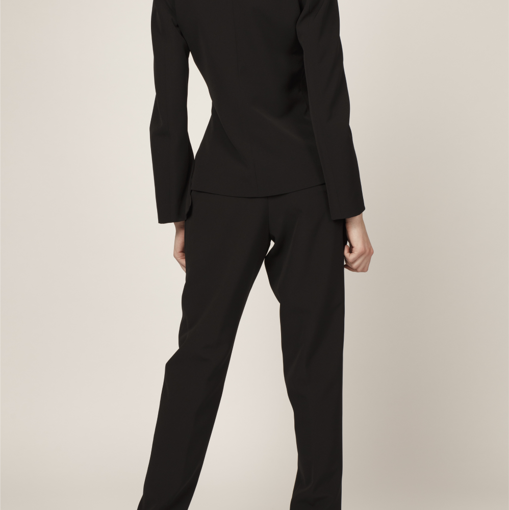 With a fitted, mid-rise waist and a slim-leg silhouette, these black trousers hold a timeless feel. 