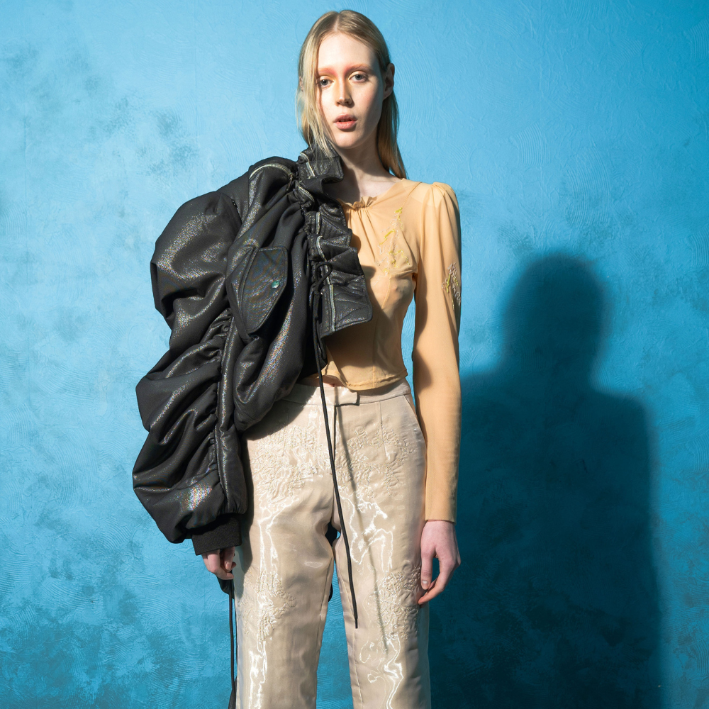 Discover the Black Shimmer Fairy Bomber at our women store. Shop Now!