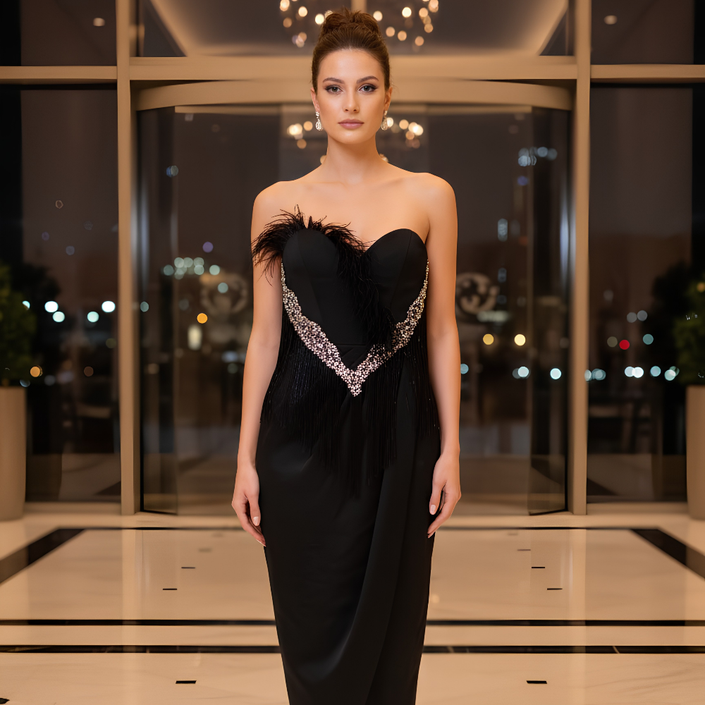 Shop the Blair black midi dress featuring a strapless design, embellished V-shaped neckline, and sleek tailored silhouette. Perfect for special occasions. Shop online from our exclusive website.