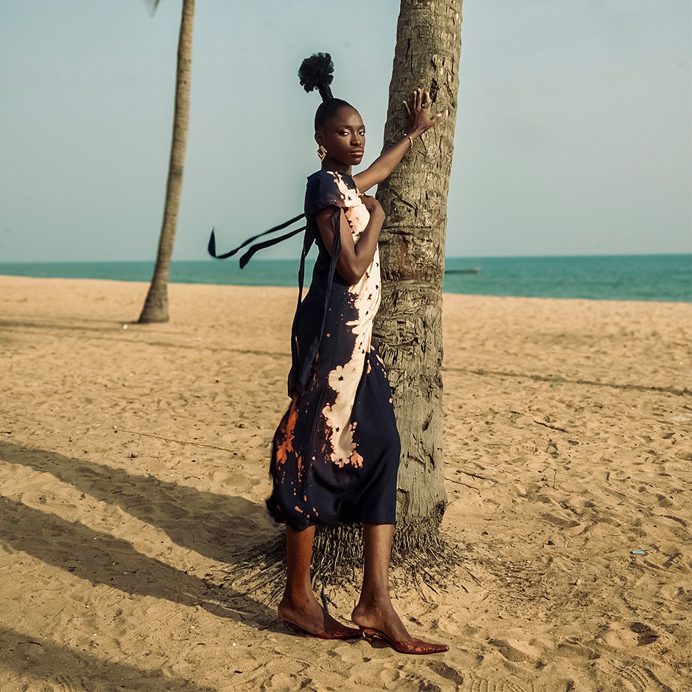 A stunning midi-length dress, with a sleeveless cut and our signature reverse dyeing technique. 