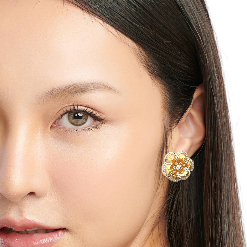 Shop online premium 18K gold flower stud earrings with sparkling cubic zirconia stones.