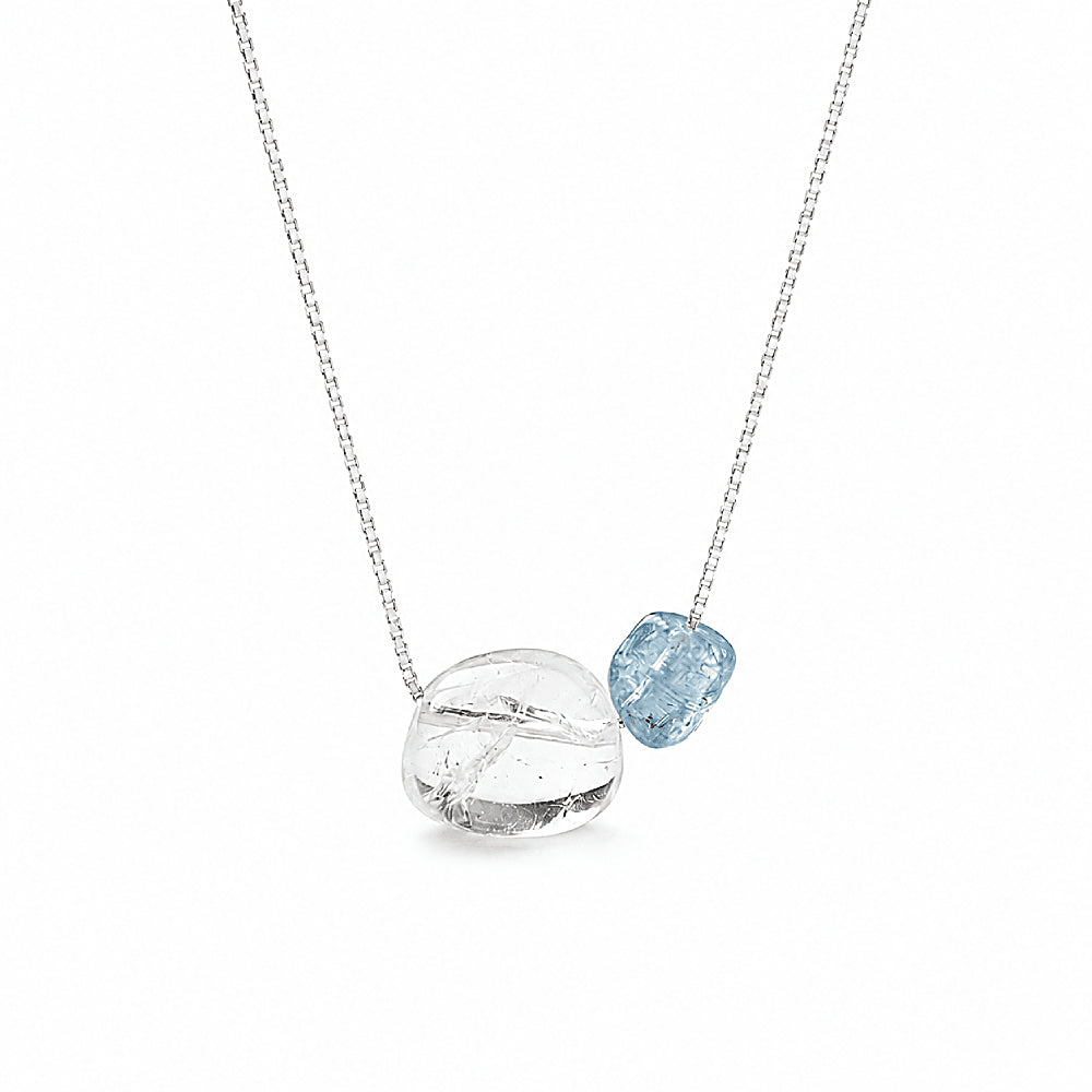 Discover the Blue Hour Aquamarine & Clear Quartz Silver Necklace at The Luxe Maison, featuring a luminous clear quartz crystal, a delicate aquamarine bead, and an S925 sterling silver chain for an elegant, ocean-inspired look.