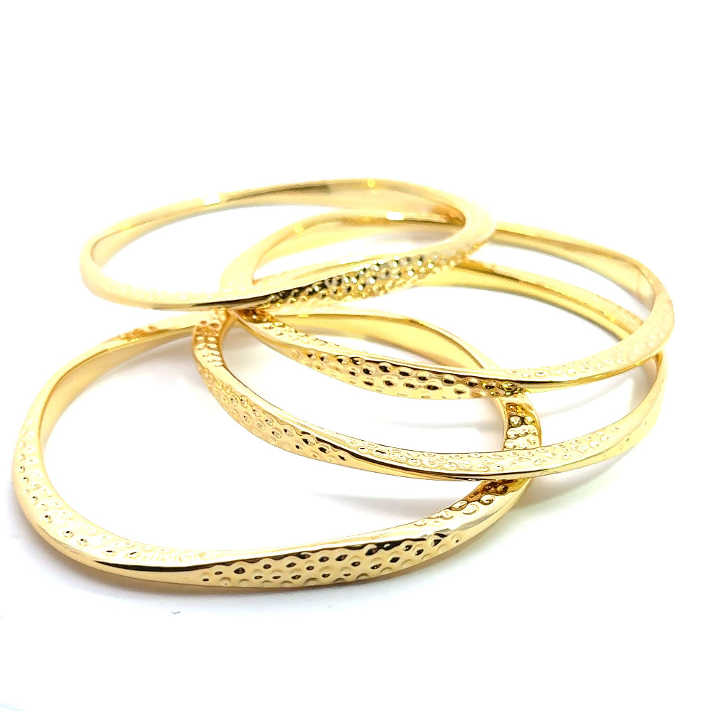 Handmade 22K yellow gold plated hammered bangle with a sleek narrow design. Perfect for stacking or solo styling. Shop premium jewelry online.