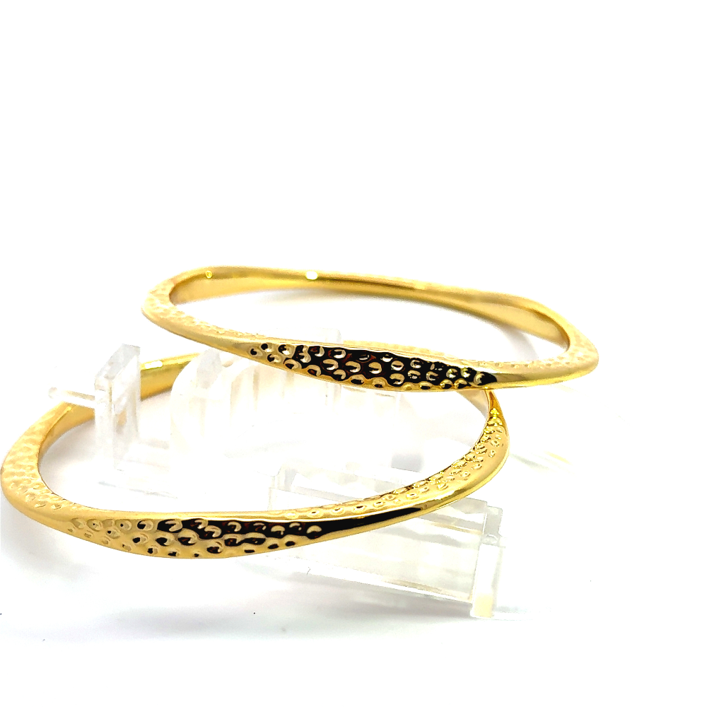 Handmade 22K yellow gold plated hammered bangle with a sleek narrow design. Perfect for stacking or solo styling. Shop premium jewelry online.