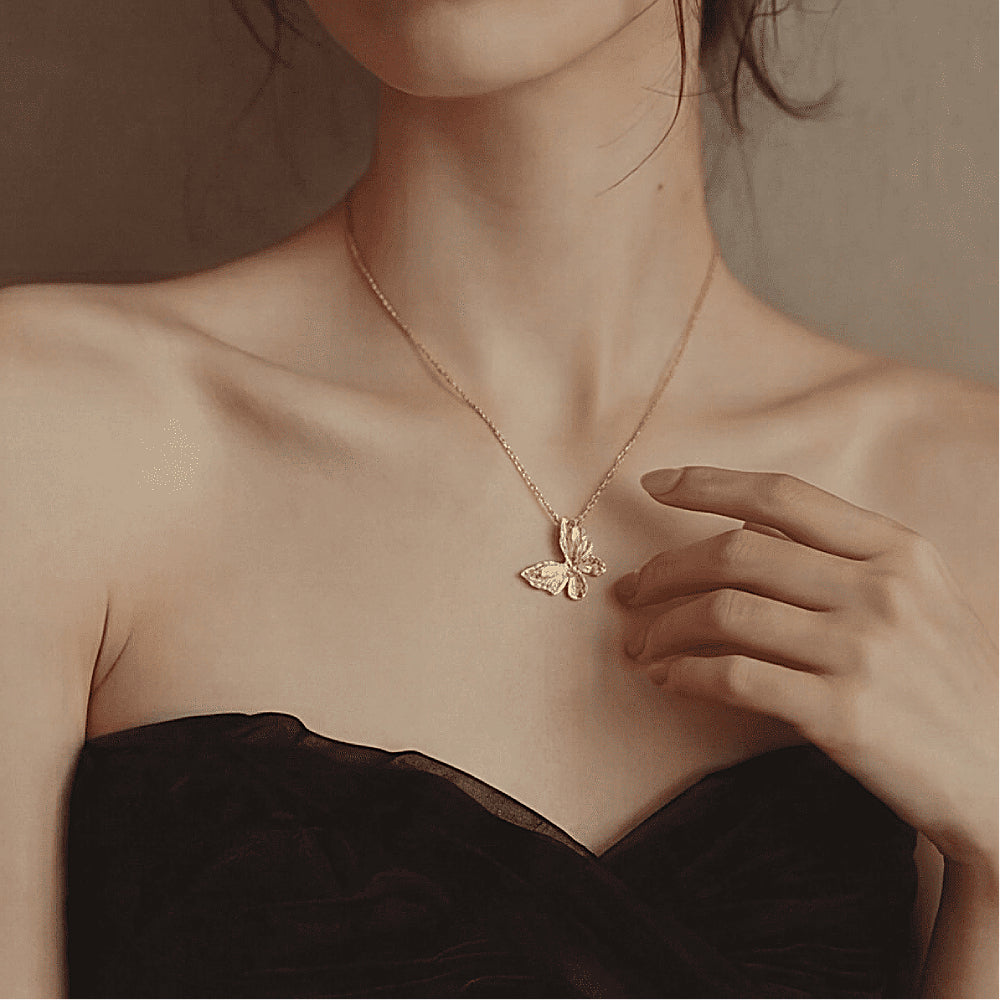 Discover the Butterfly Reverie Gold Vermeil Necklace at The Luxe Maison, featuring a hand-brushed butterfly pendant crafted in S925 sterling silver with a luminous gold vermeil finish for a timeless, elegant look.