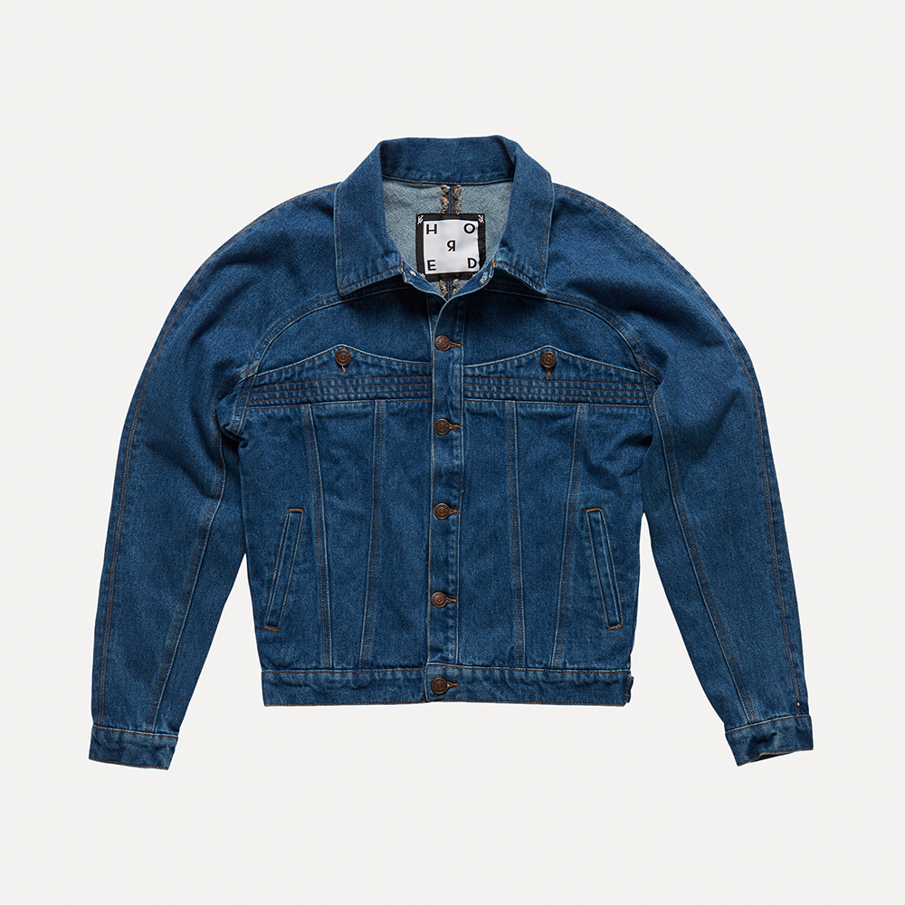 Dark blue 100% cotton organic stonewashed paneled denim jacket cut for a boxy fit. 