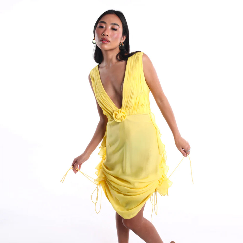 Canary yellow chiffon dress with V neck and pleats, perfect for brunch and events. Shop online from our curated edit of premium fashion.