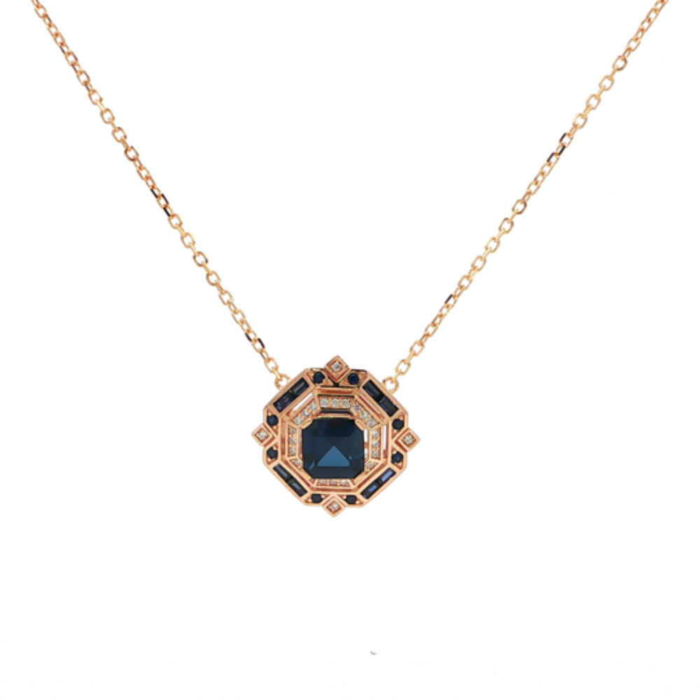 Shop online premium 18K gold-dipped blue sapphire necklace with cubic zirconia stones.