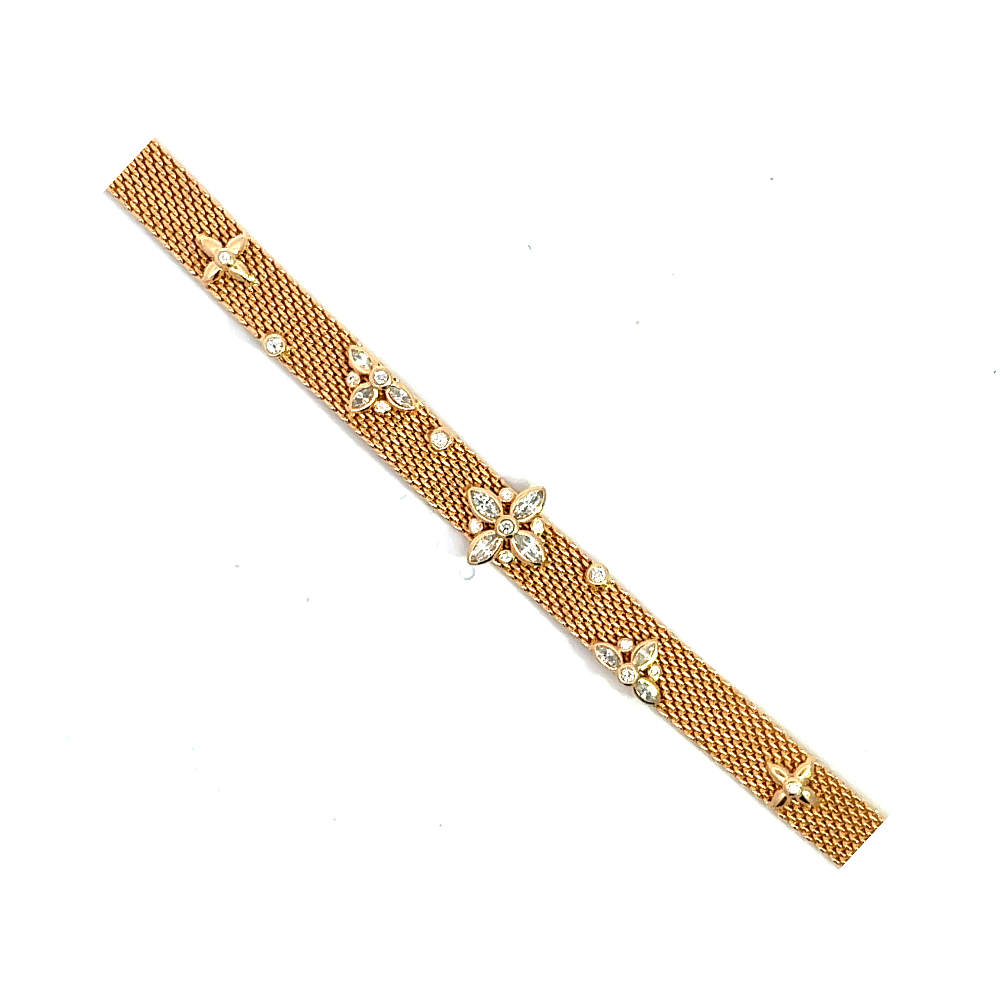 Sterling silver 18k gold-dipped watch-style net bracelet with a detailed center design and sparkling cubic zirconia accents. Shop premium jewelry online.