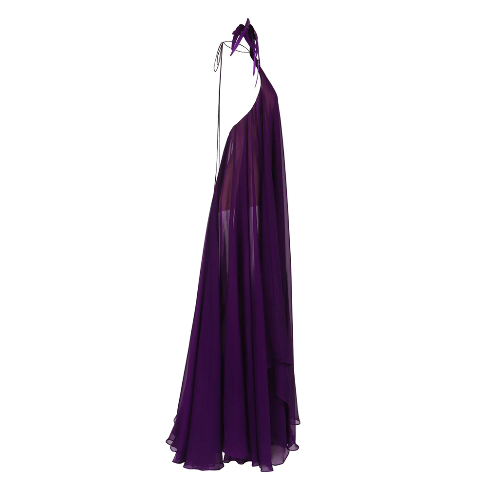 A purple chiffon halter neck dress finished with coq tail plumes.