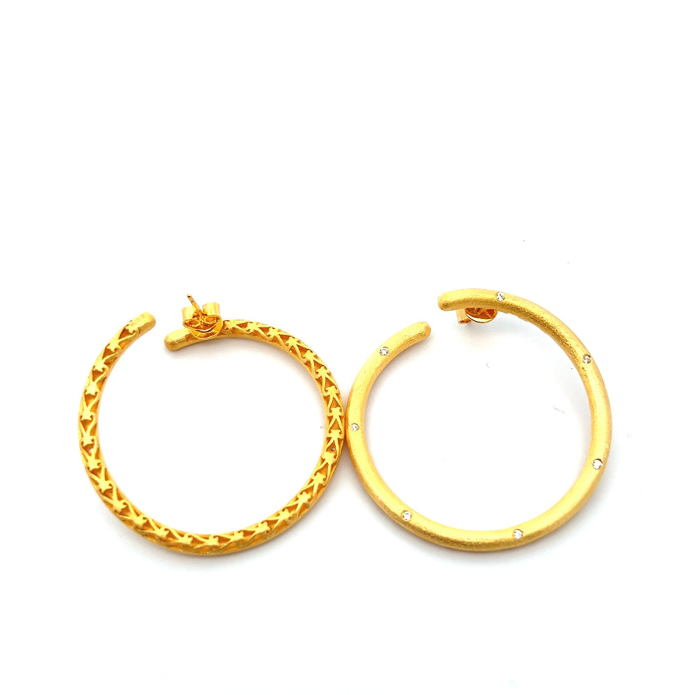 Shop online premium 18K gold-dipped hoop earrings with sparkling cubic zirconia stones.