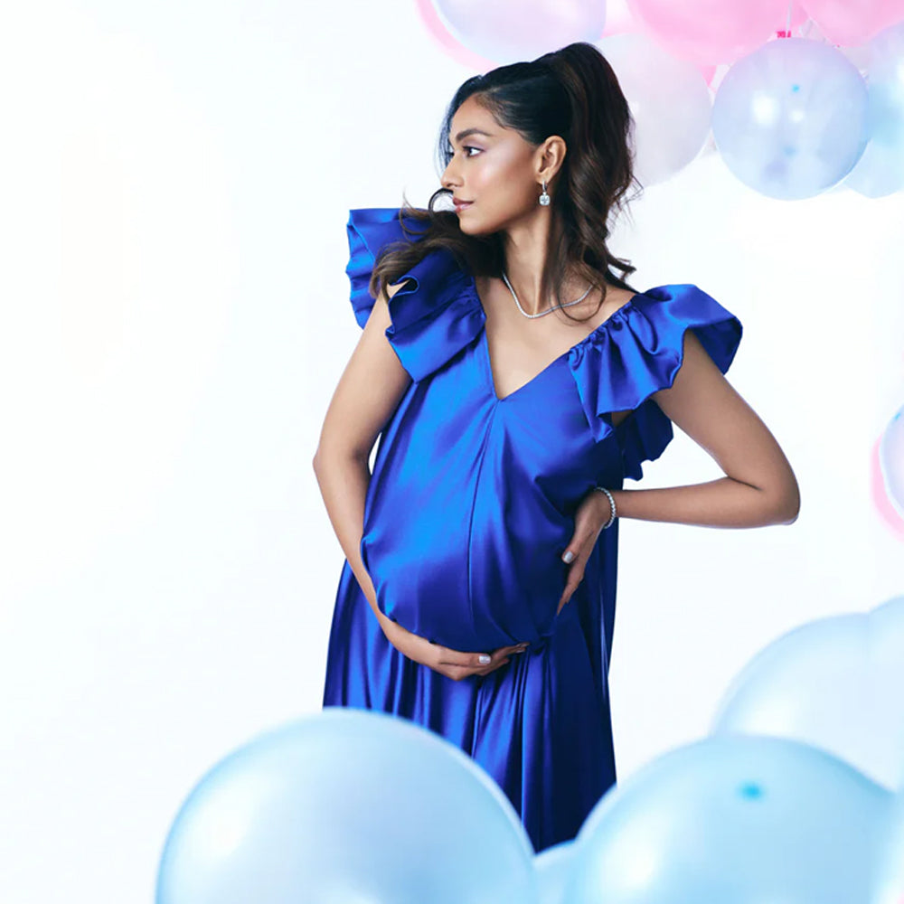 Maternity satin dress with ruffled sleeves and fluid fit, perfect for events. Shop online from our curated edit of premium fashion.